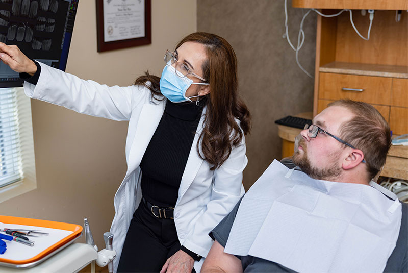 doctor showing patient display