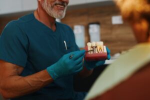 Dentist and patient discussing dental implants in a Minneapolis office.